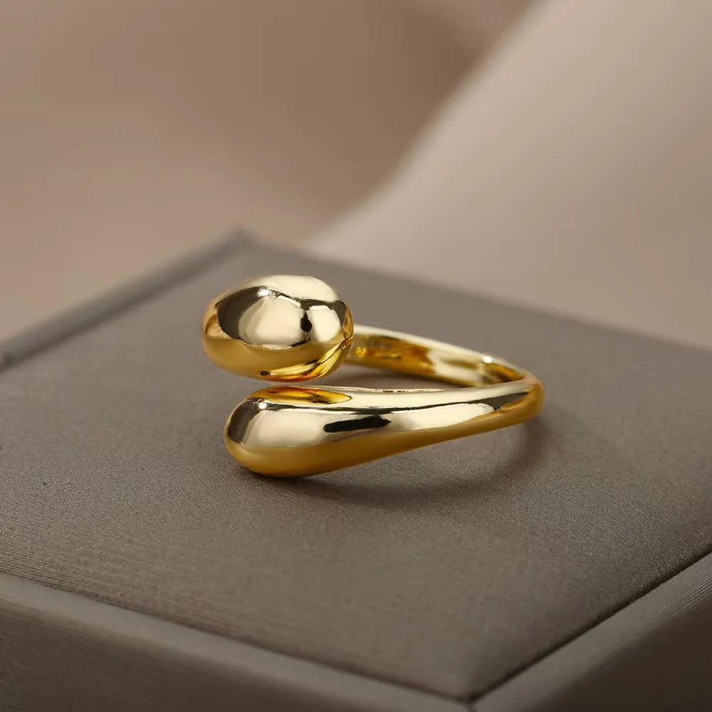 A ladies' stainless steel glossy double-ball open gold ring